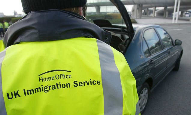 A UK Immigration Service officer conducting inspections, highlighting the government's efforts to tackle visa abuse and hold rogue employers accountable for unethical recruitment practices.