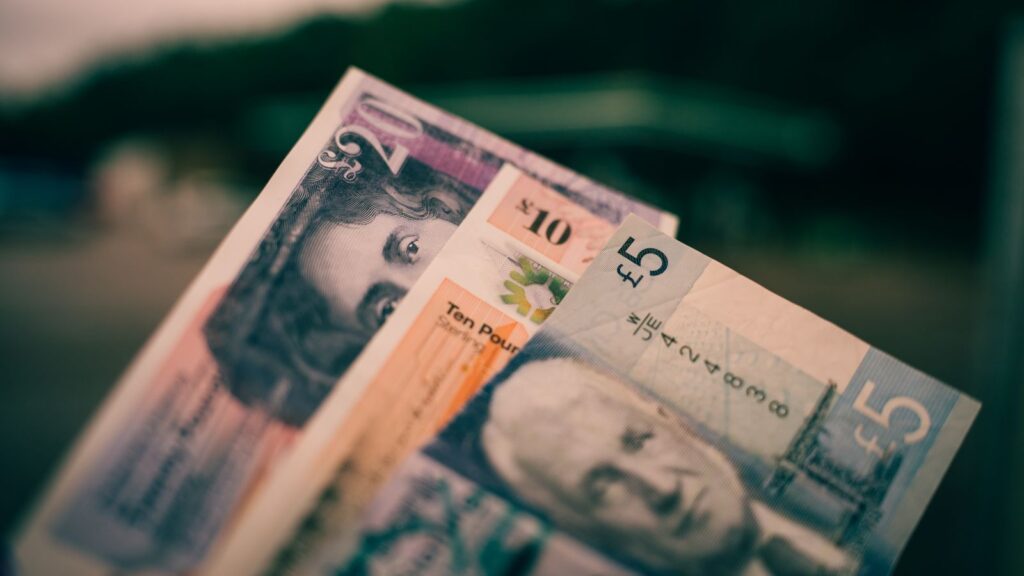 British five and ten pound notes, illustrating UK Home Office visa fees for October 2026